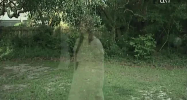 Ghostly figure of woman in white
